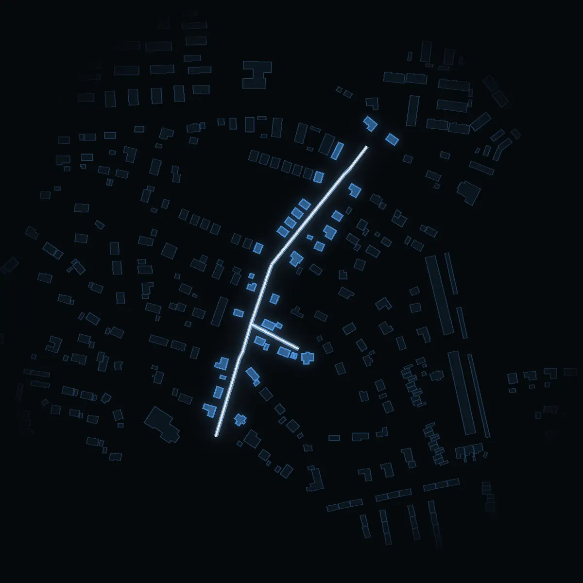 The street at night: Ängsvägen drawn in white, its buildings lit in the colour of their area’s income