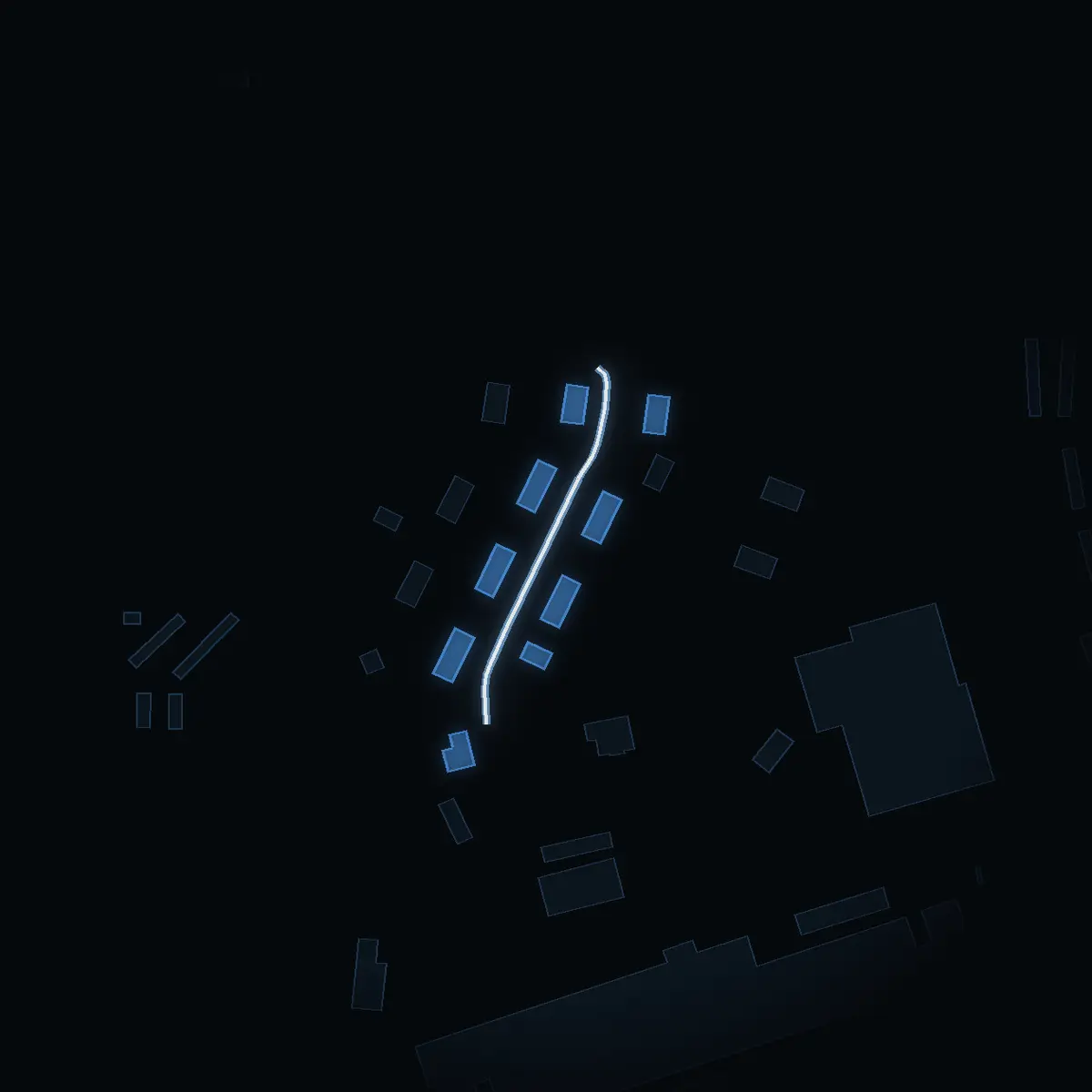 The street at night: Fiebelkornsvägen drawn in white, its buildings lit in the colour of their area’s income