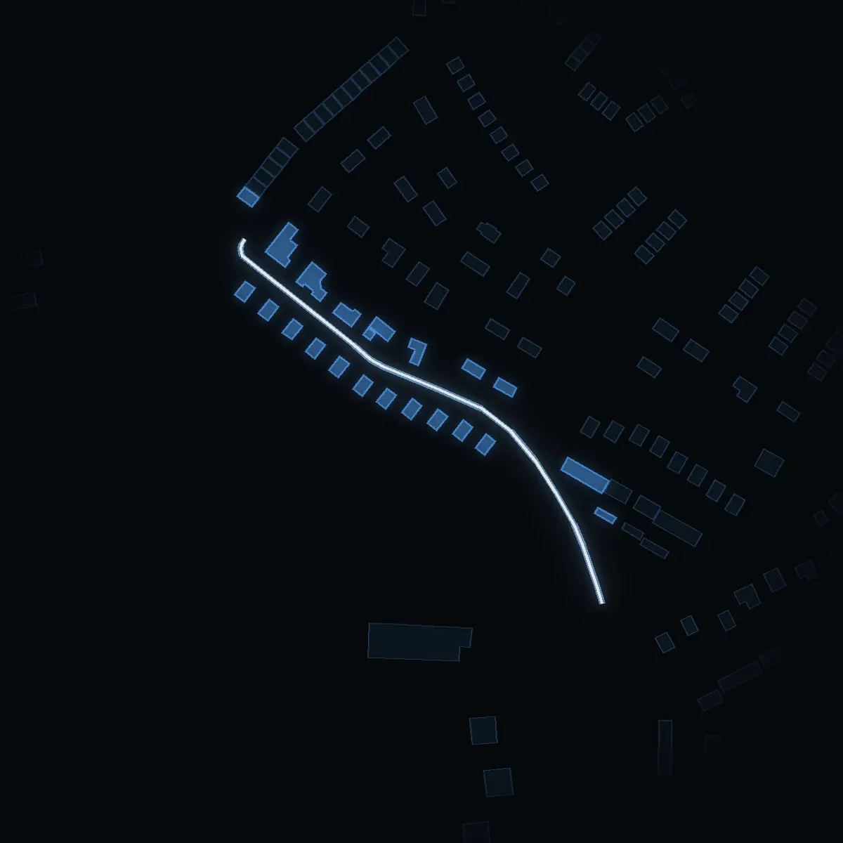 The street at night: Korpvägen drawn in white, its buildings lit in the colour of their area’s income