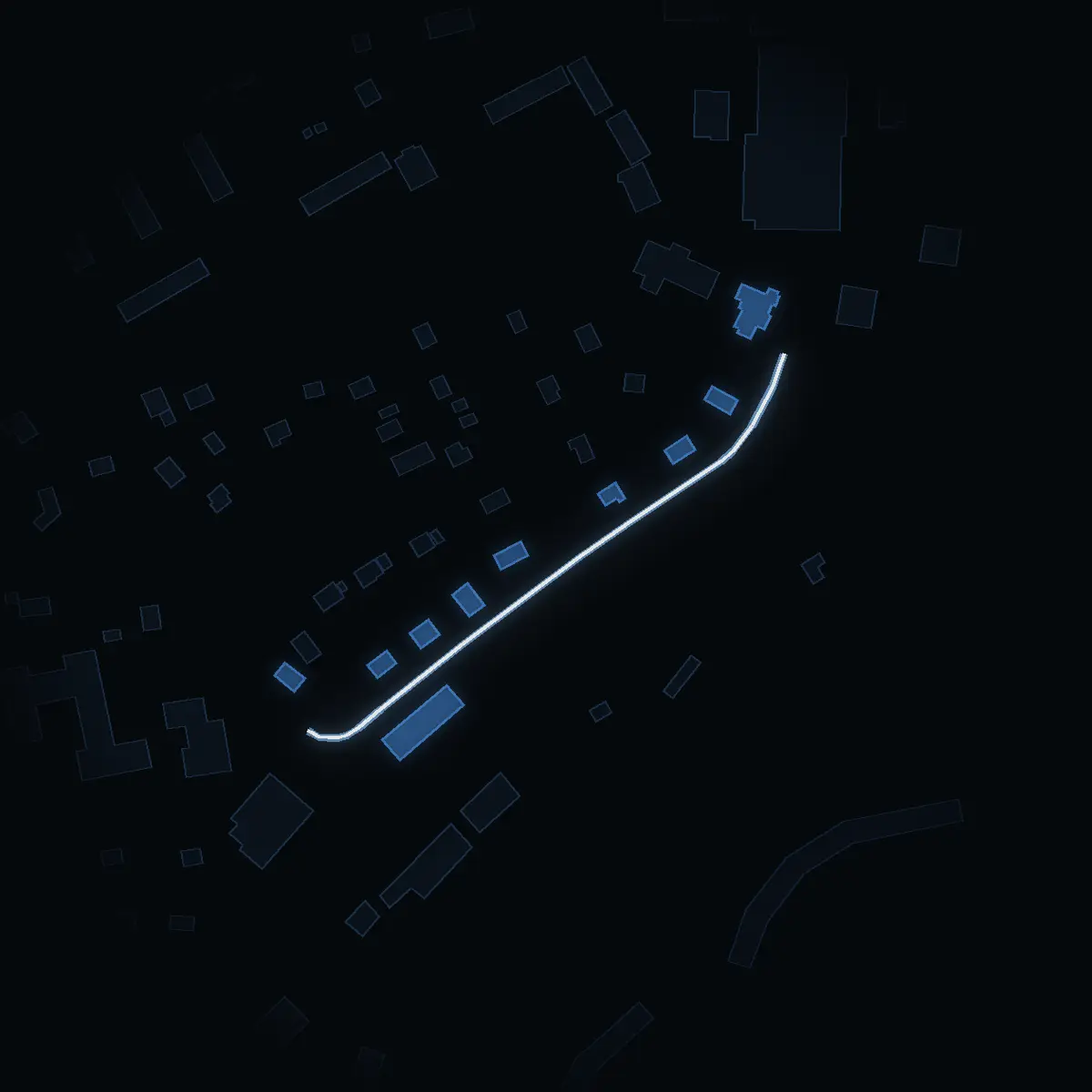The street at night: Länsmansvägen drawn in white, its buildings lit in the colour of their area’s income
