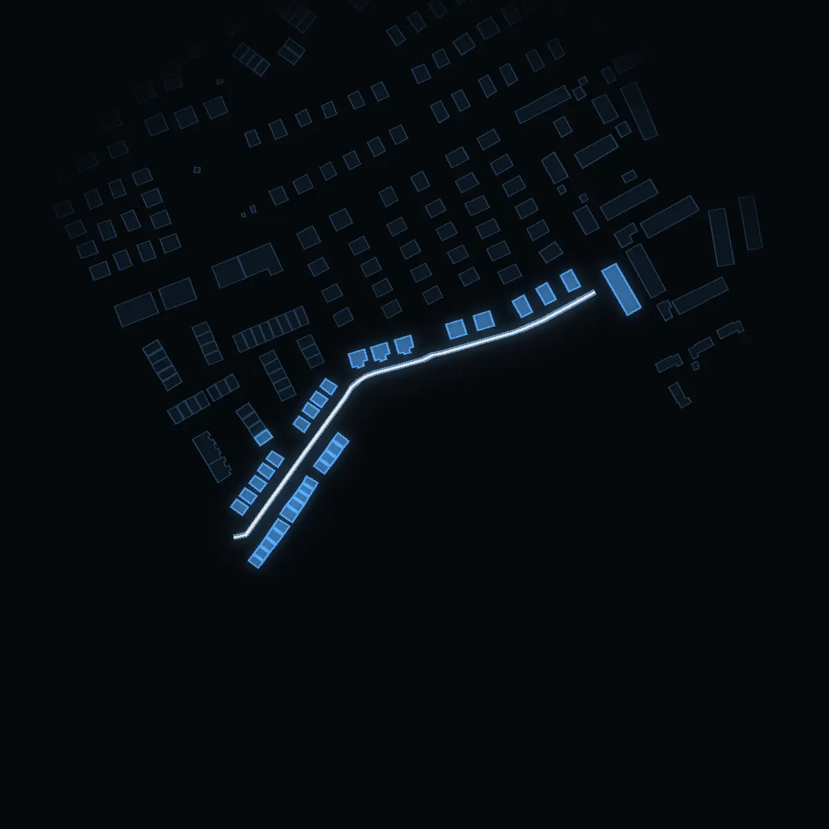 The street at night: Naturvägen drawn in white, its buildings lit in the colour of their area’s income