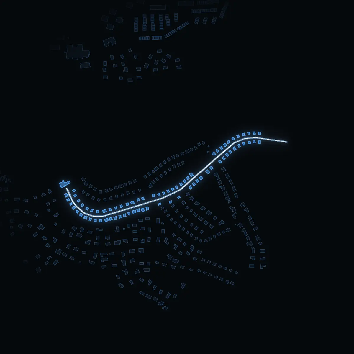 The street at night: Smedvägen drawn in white, its buildings lit in the colour of their area’s income