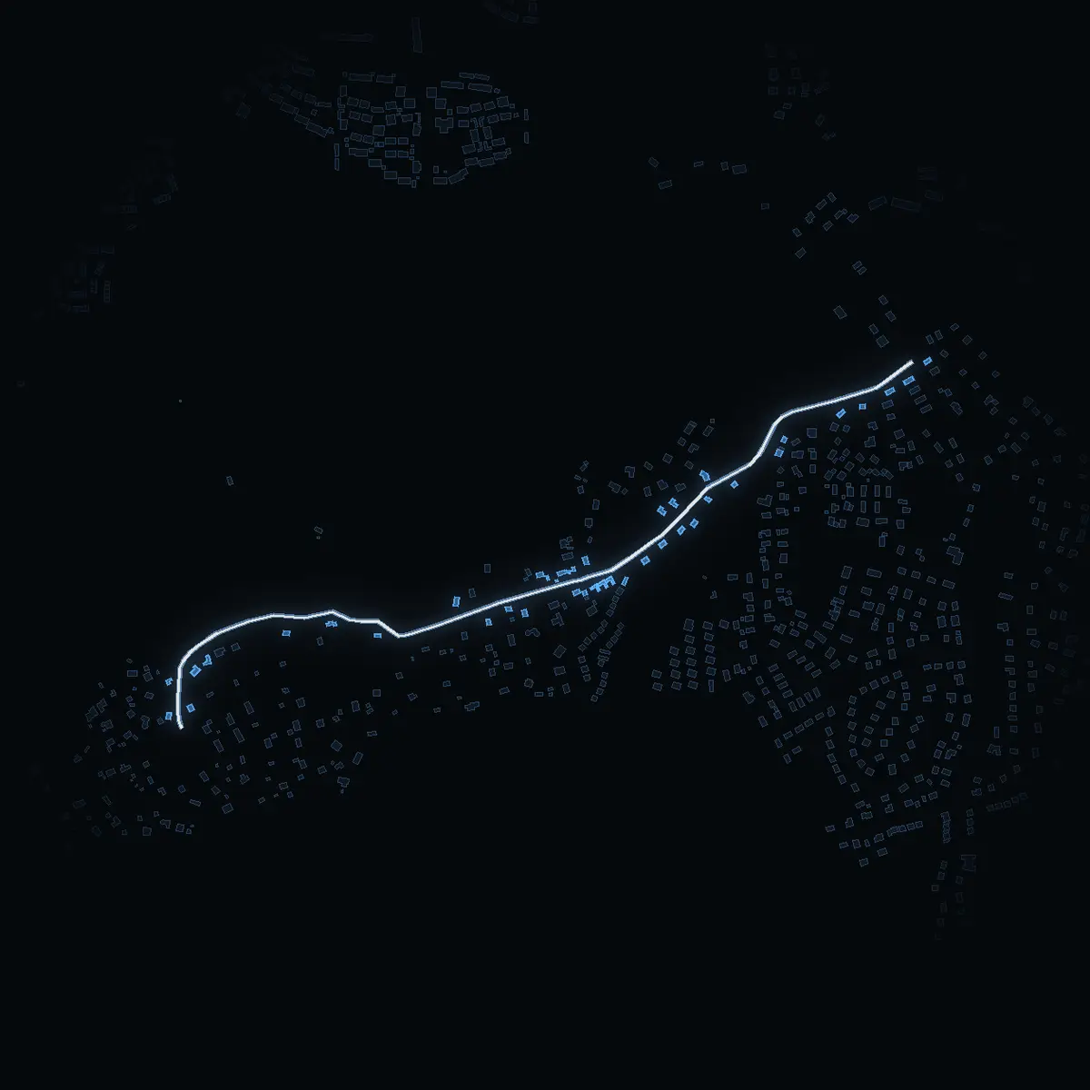 The street at night: Strandvägen drawn in white, its buildings lit in the colour of their area’s income