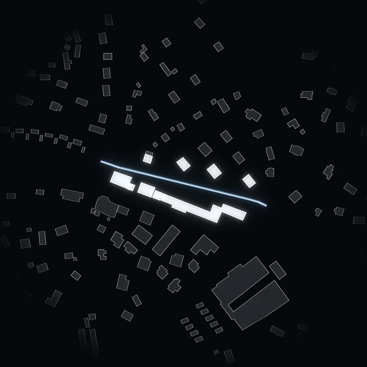 The street at night: Gudmundvägen drawn in white, its buildings lit in the colour of their area’s income