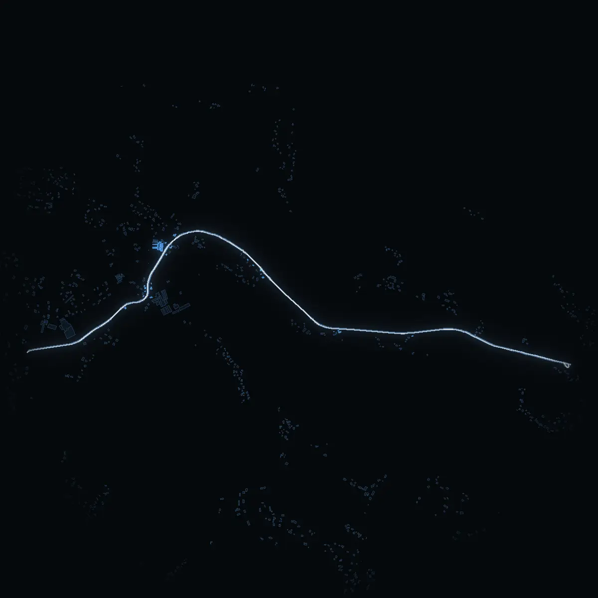 The street at night: Björkviksvägen drawn in white, its buildings lit in the colour of their area’s income