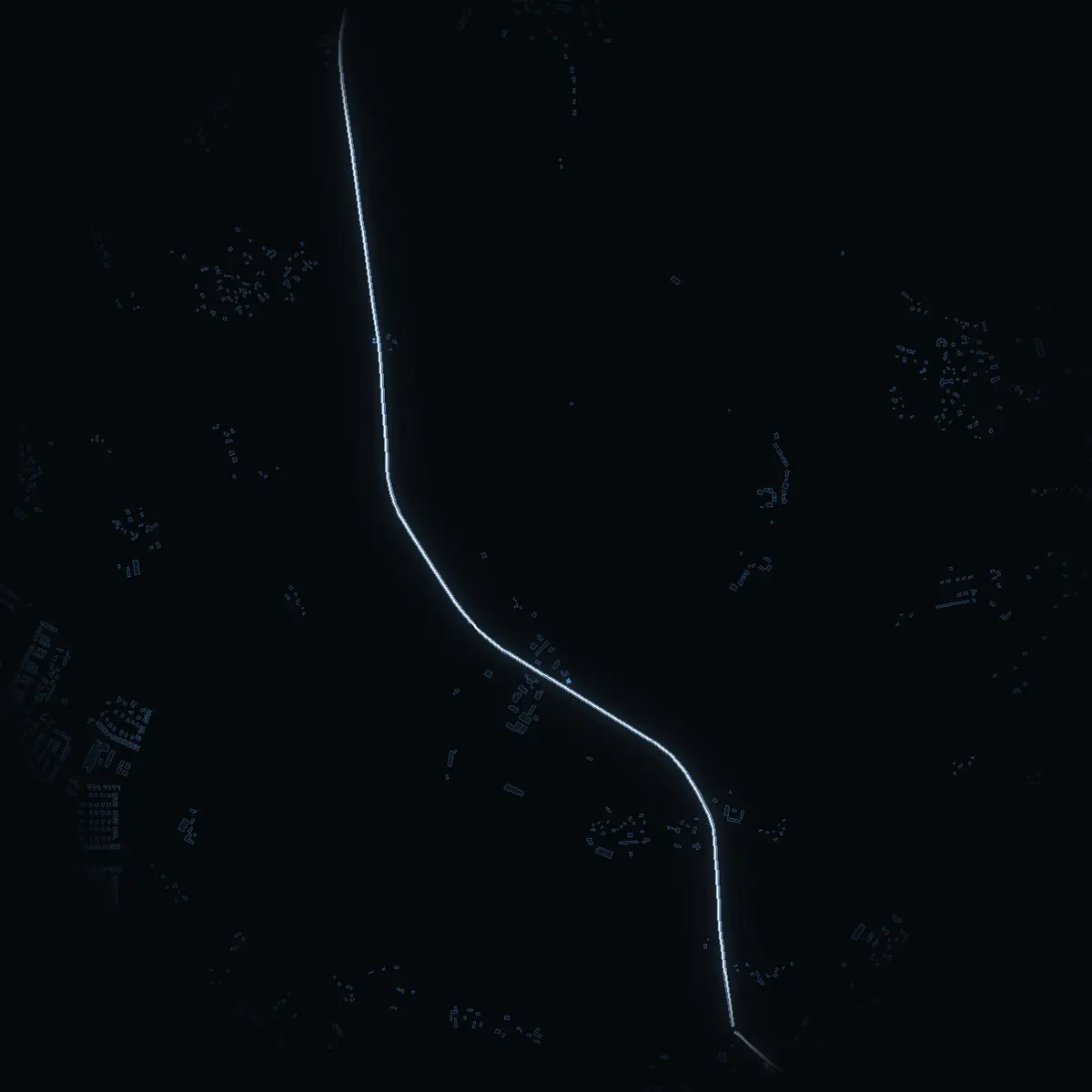 The street at night: Färentunavägen drawn in white, its buildings lit in the colour of their area’s income