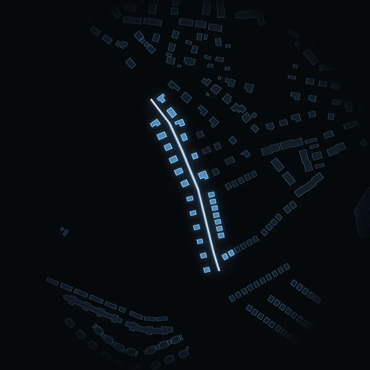 The street at night: Vävnadsvägen drawn in white, its buildings lit in the colour of their area’s income