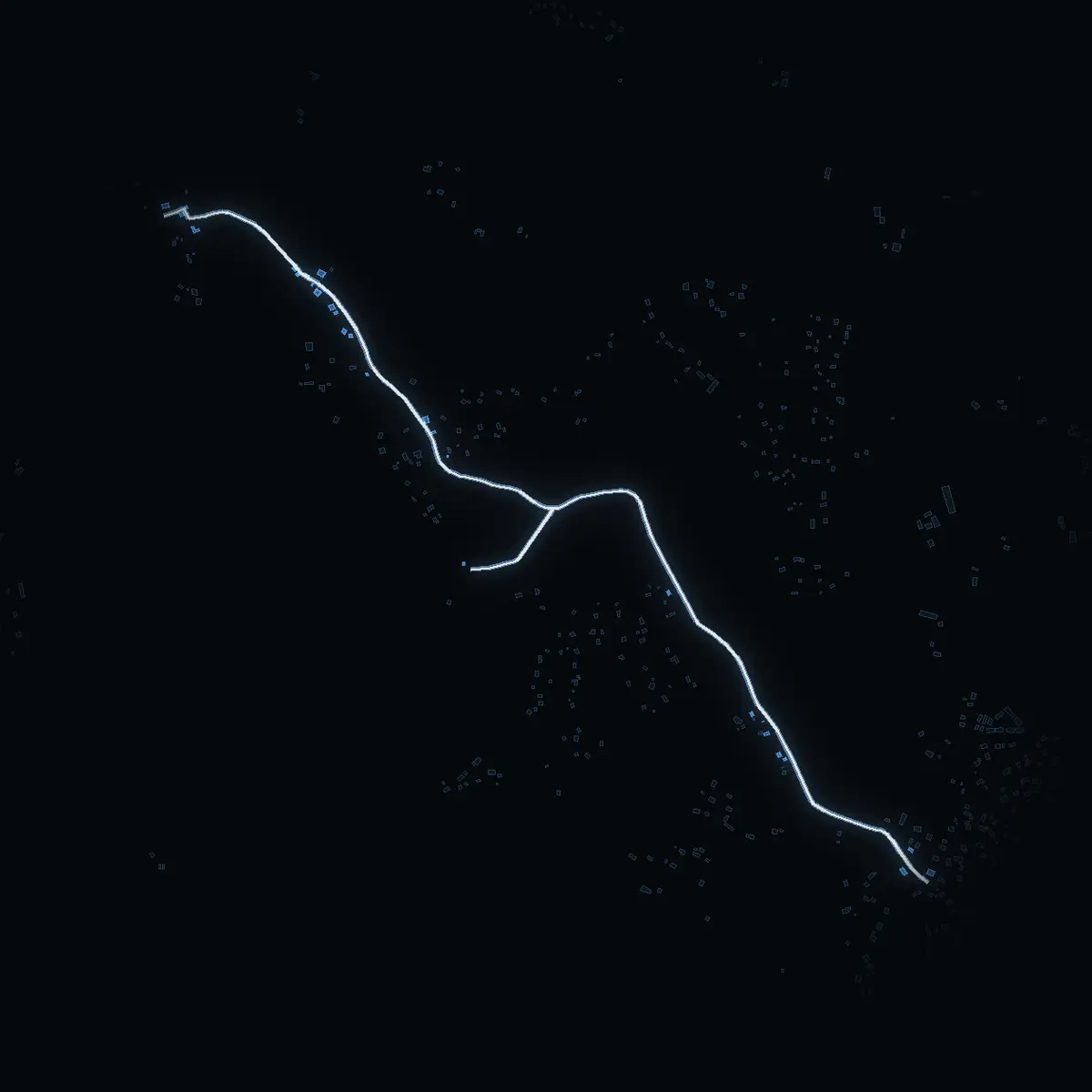The street at night: Vendeluddsvägen drawn in white, its buildings lit in the colour of their area’s income