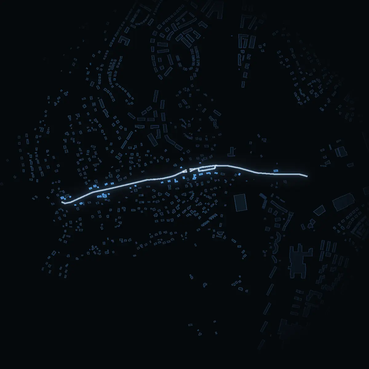 The street at night: Kolartorps allé drawn in white, its buildings lit in the colour of their area’s income