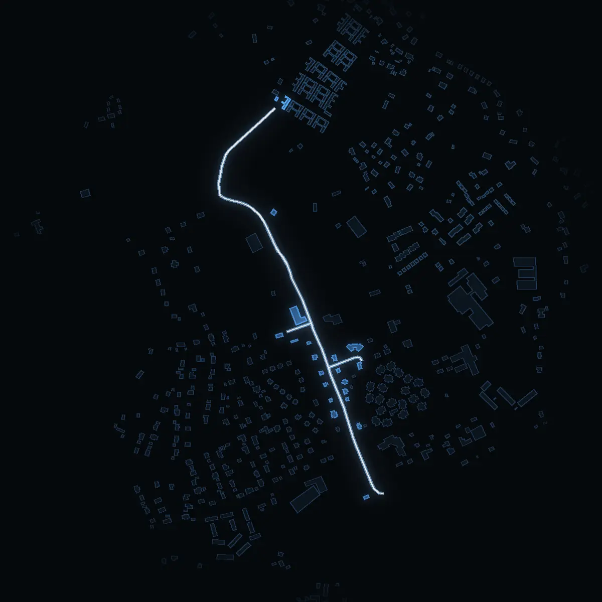 The street at night: Kvarnvägen drawn in white, its buildings lit in the colour of their area’s income