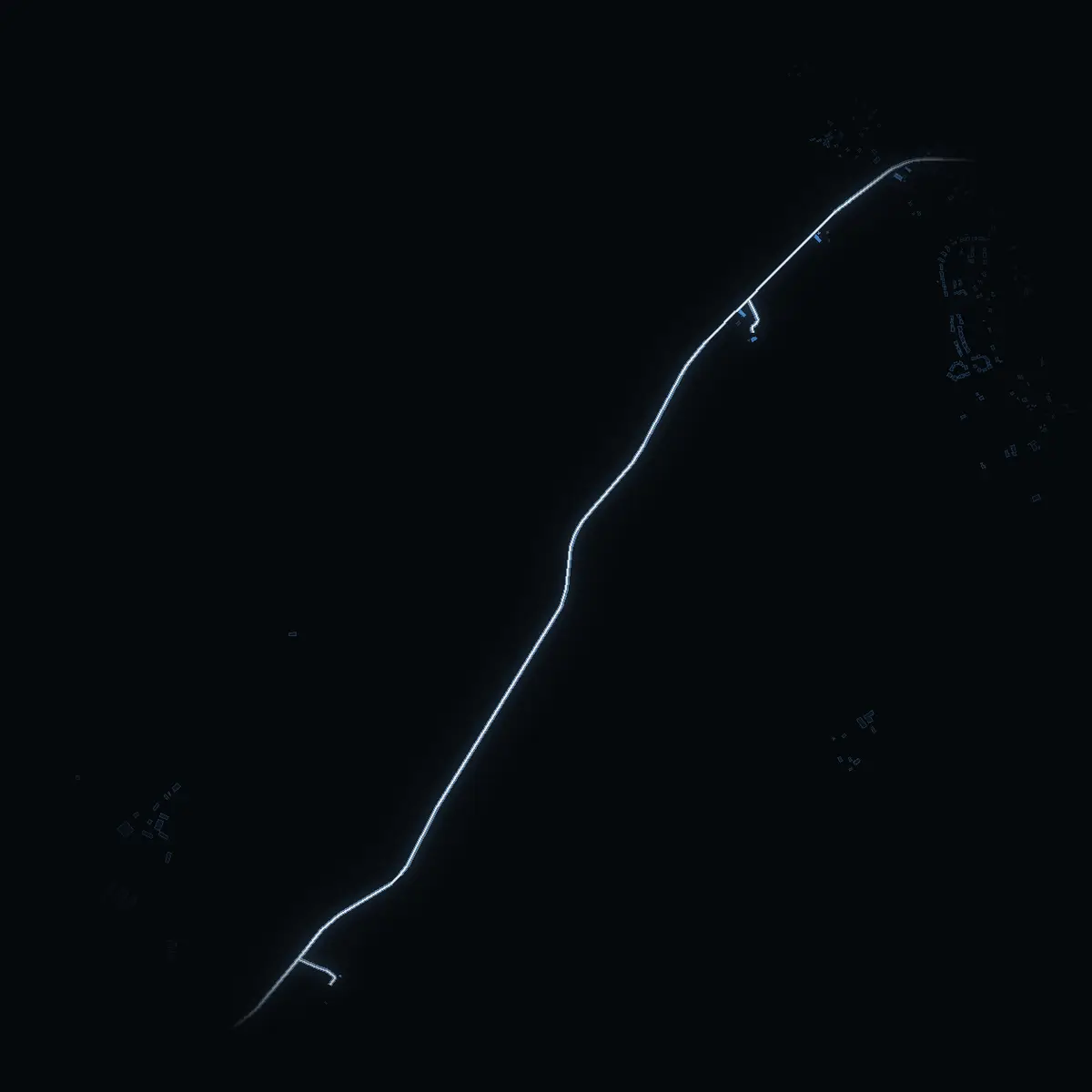 The street at night: Muskövägen drawn in white, its buildings lit in the colour of their area’s income
