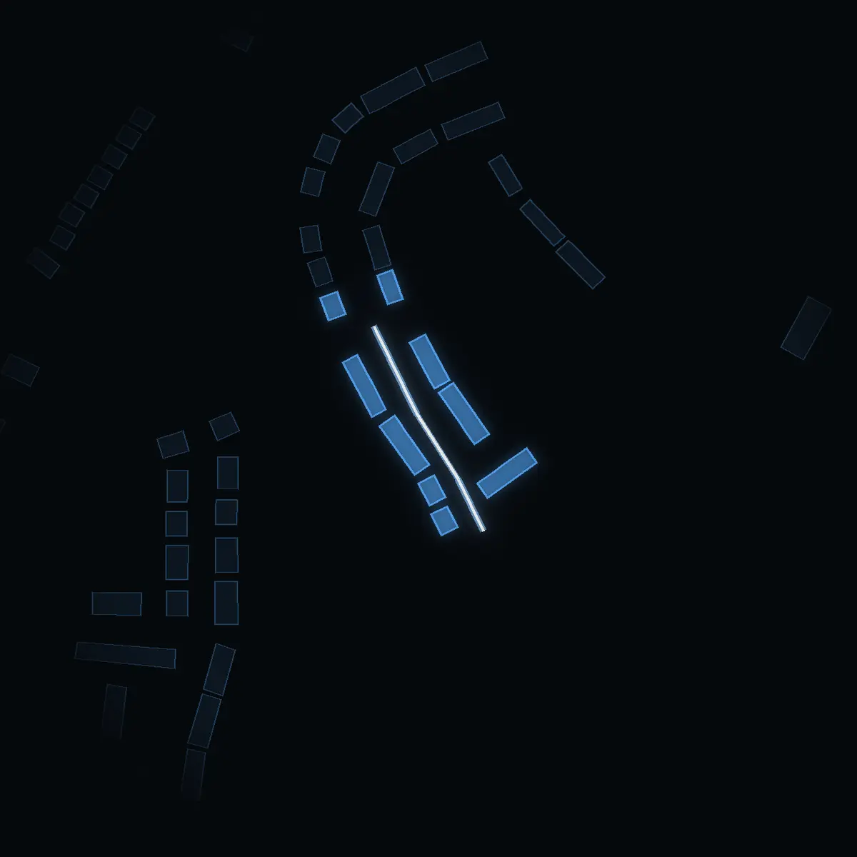The street at night: Rullharvsvägen drawn in white, its buildings lit in the colour of their area’s income
