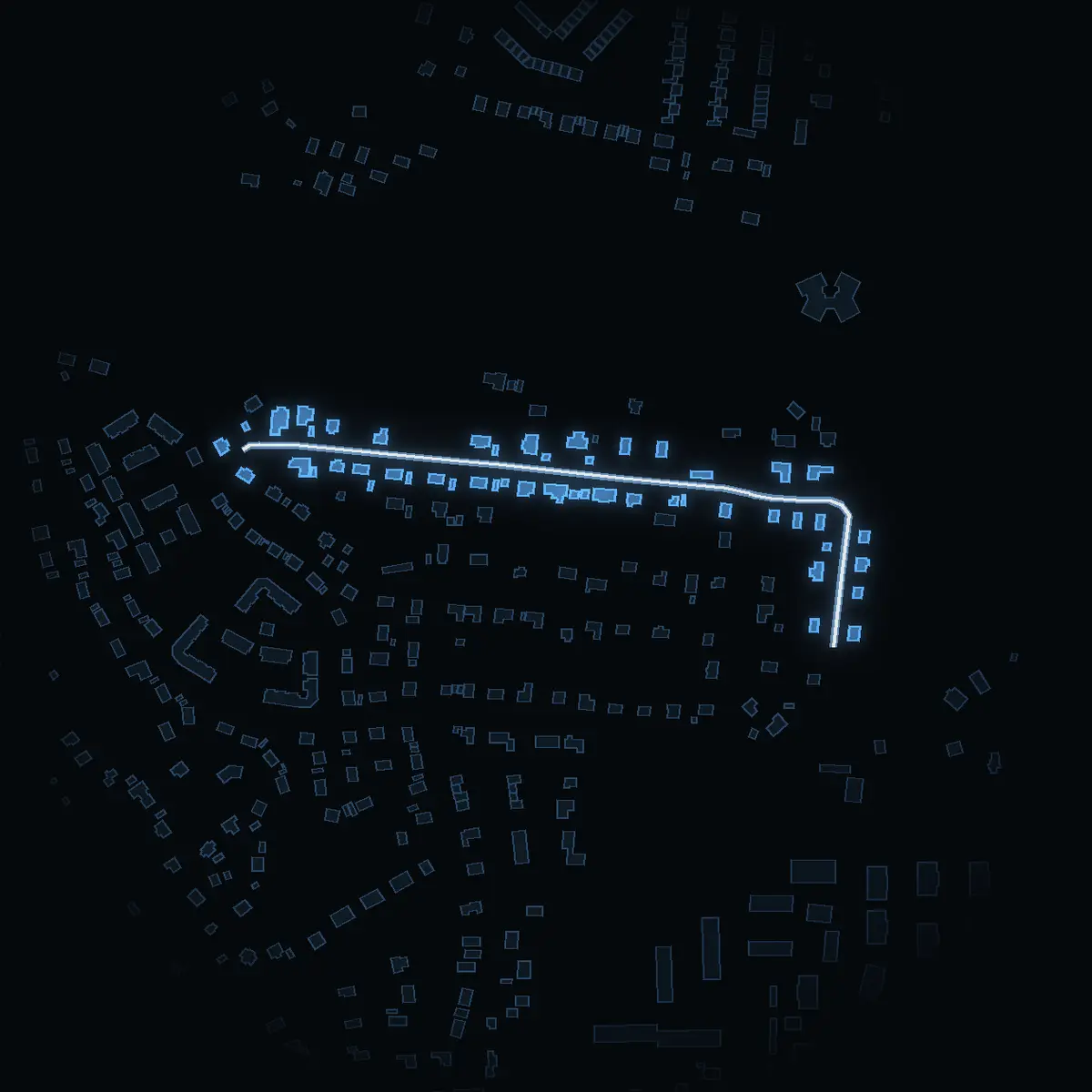 The street at night: Smålandsvägen drawn in white, its buildings lit in the colour of their area’s income