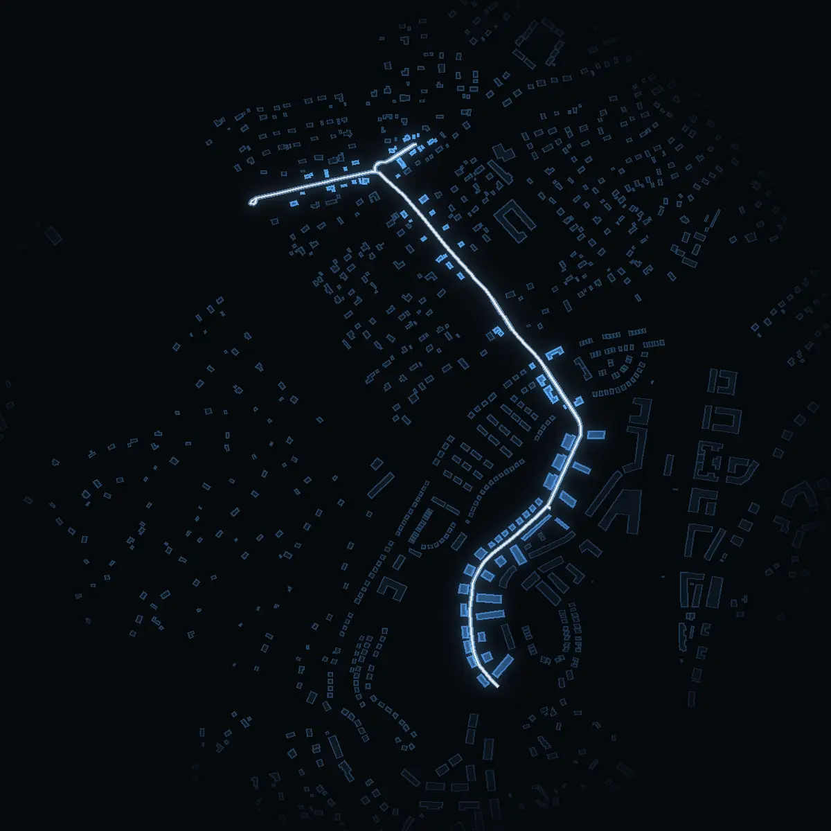 The street at night: Vardövägen drawn in white, its buildings lit in the colour of their area’s income