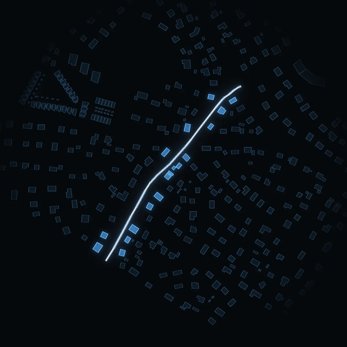 The street at night: Ejdervägen drawn in white, its buildings lit in the colour of their area’s income