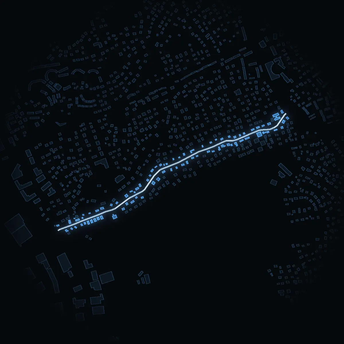 The street at night: Hagvägen drawn in white, its buildings lit in the colour of their area’s income