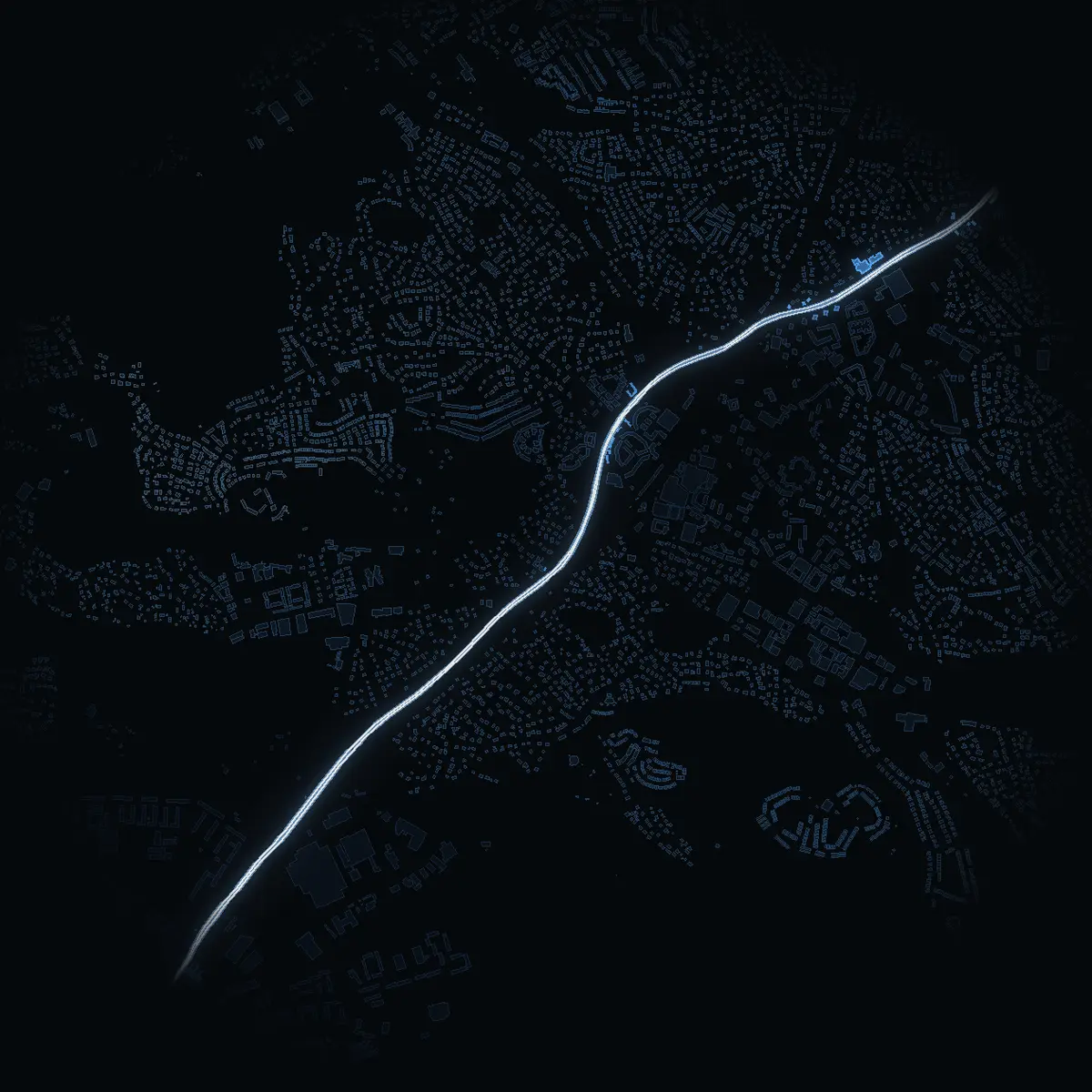 The street at night: Huddingevägen drawn in white, its buildings lit in the colour of their area’s income