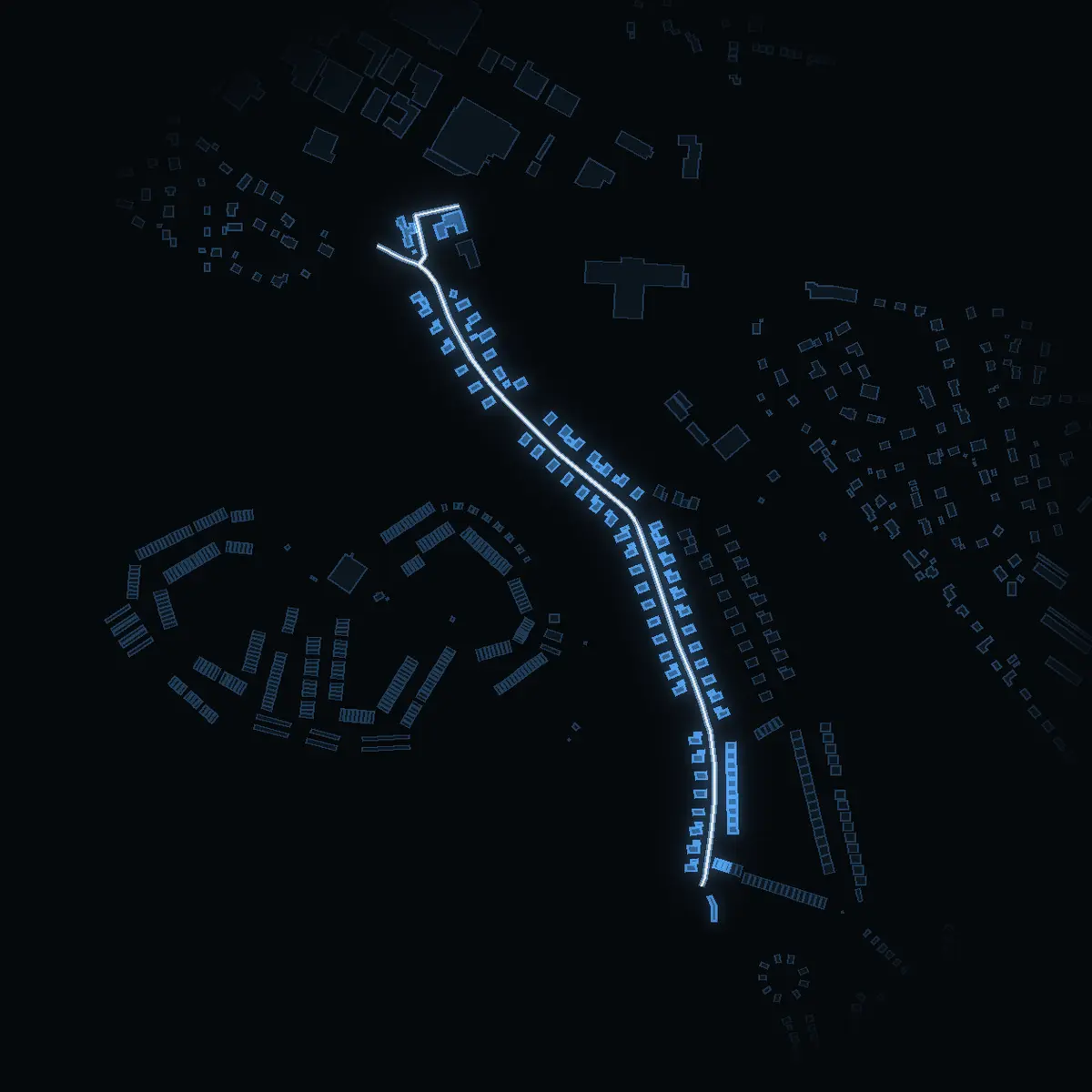The street at night: Musseronvägen drawn in white, its buildings lit in the colour of their area’s income