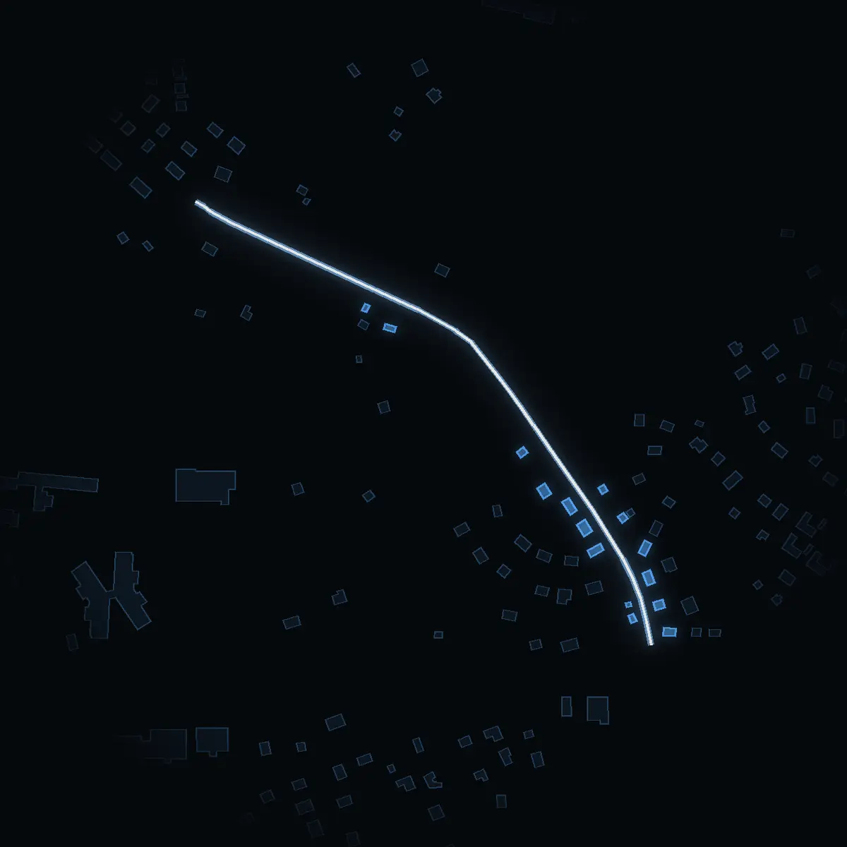 The street at night: Rosenhillsvägen drawn in white, its buildings lit in the colour of their area’s income