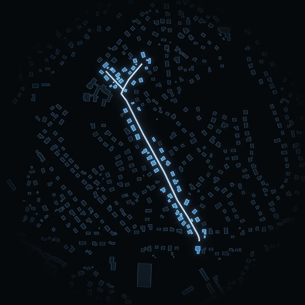 The street at night: Söderåkersvägen drawn in white, its buildings lit in the colour of their area’s income