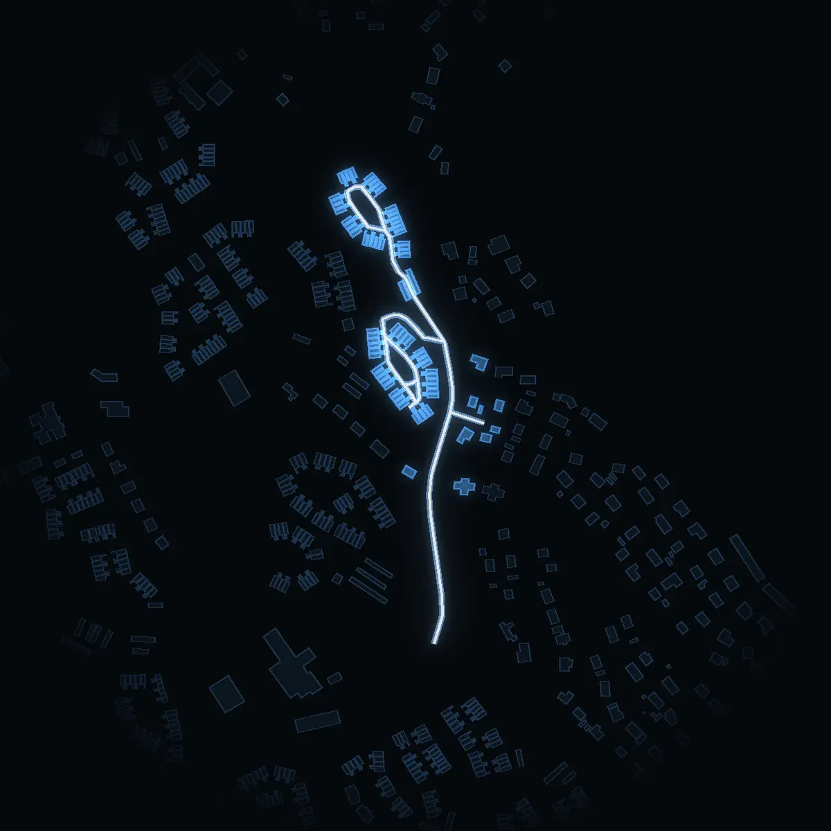 The street at night: Sopranvägen drawn in white, its buildings lit in the colour of their area’s income