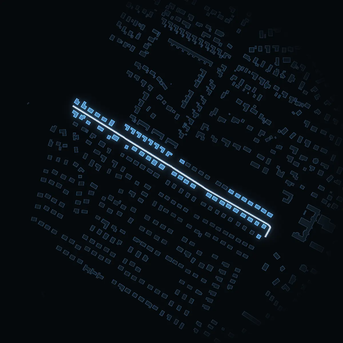 The street at night: Aprilvägen drawn in white, its buildings lit in the colour of their area’s income