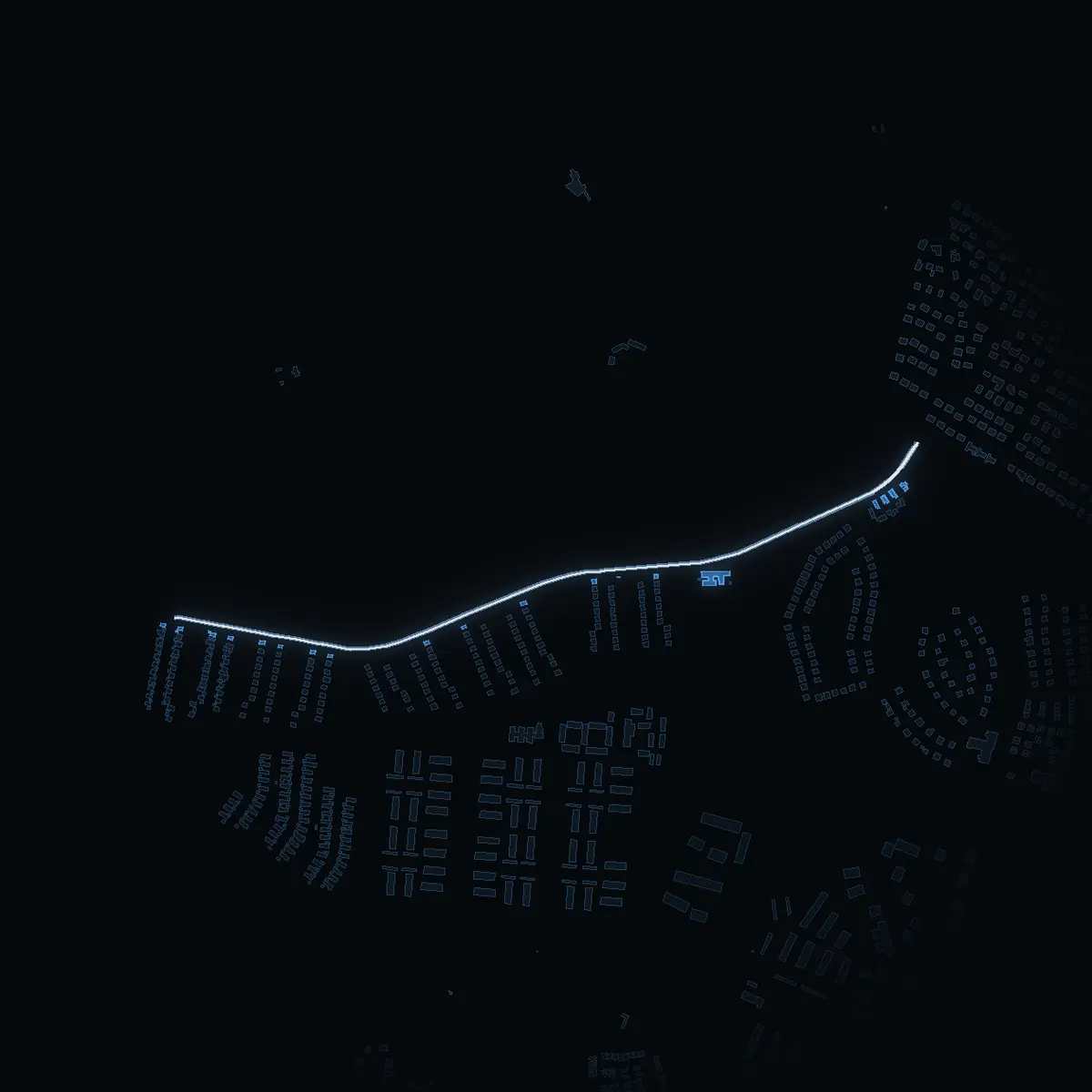 The street at night: Råstensvägen drawn in white, its buildings lit in the colour of their area’s income