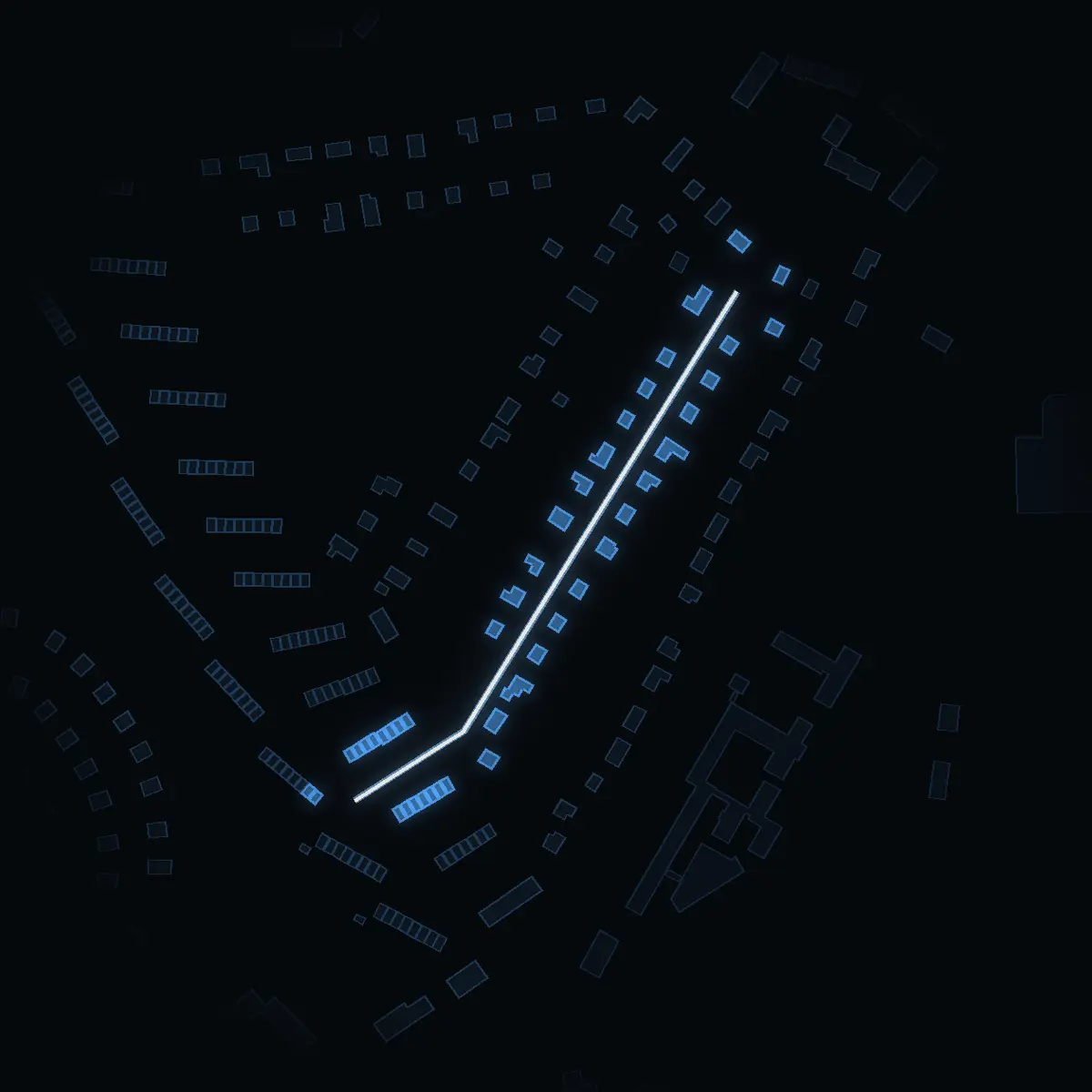 The street at night: Relävägen drawn in white, its buildings lit in the colour of their area’s income