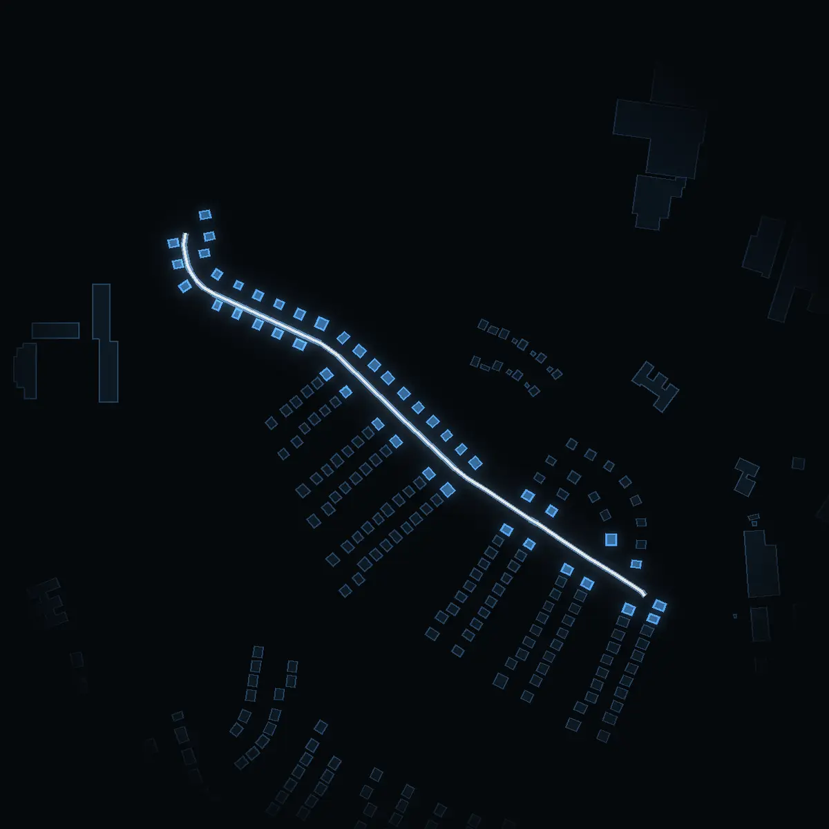 The street at night: Slåttervägen drawn in white, its buildings lit in the colour of their area’s income