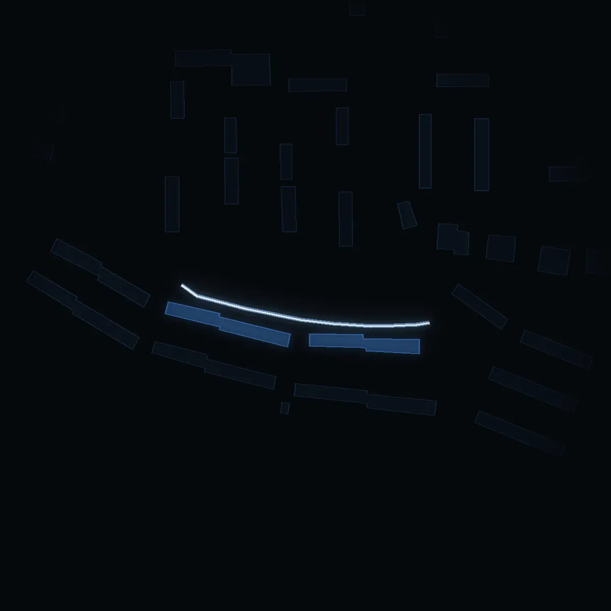 The street at night: Tomasvägen drawn in white, its buildings lit in the colour of their area’s income