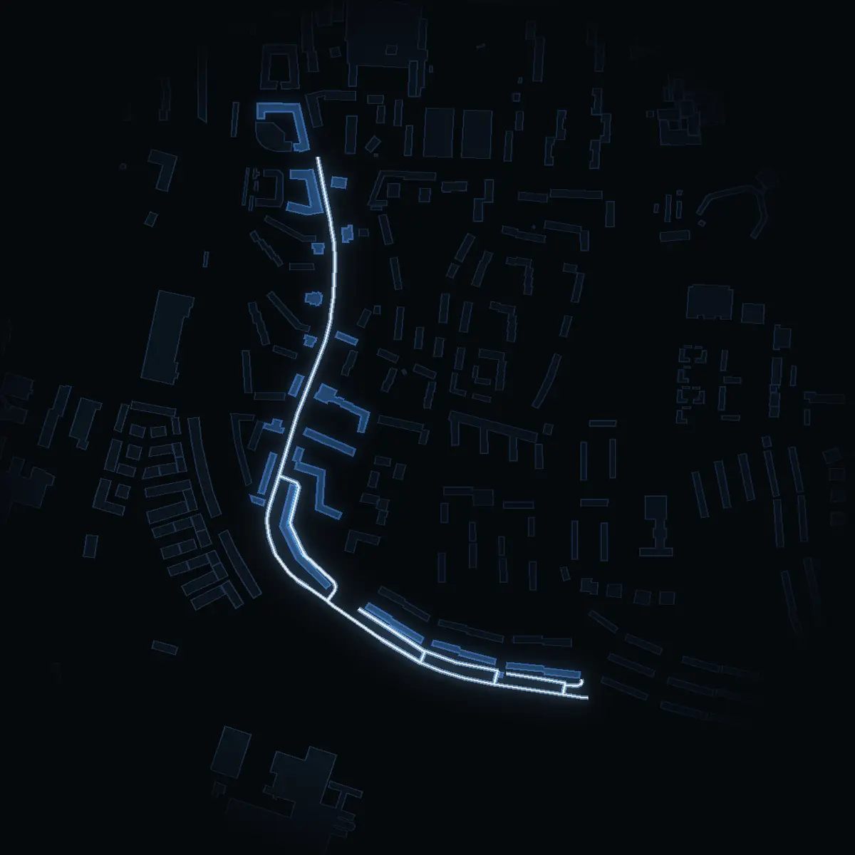 The street at night: Vasavägen drawn in white, its buildings lit in the colour of their area’s income