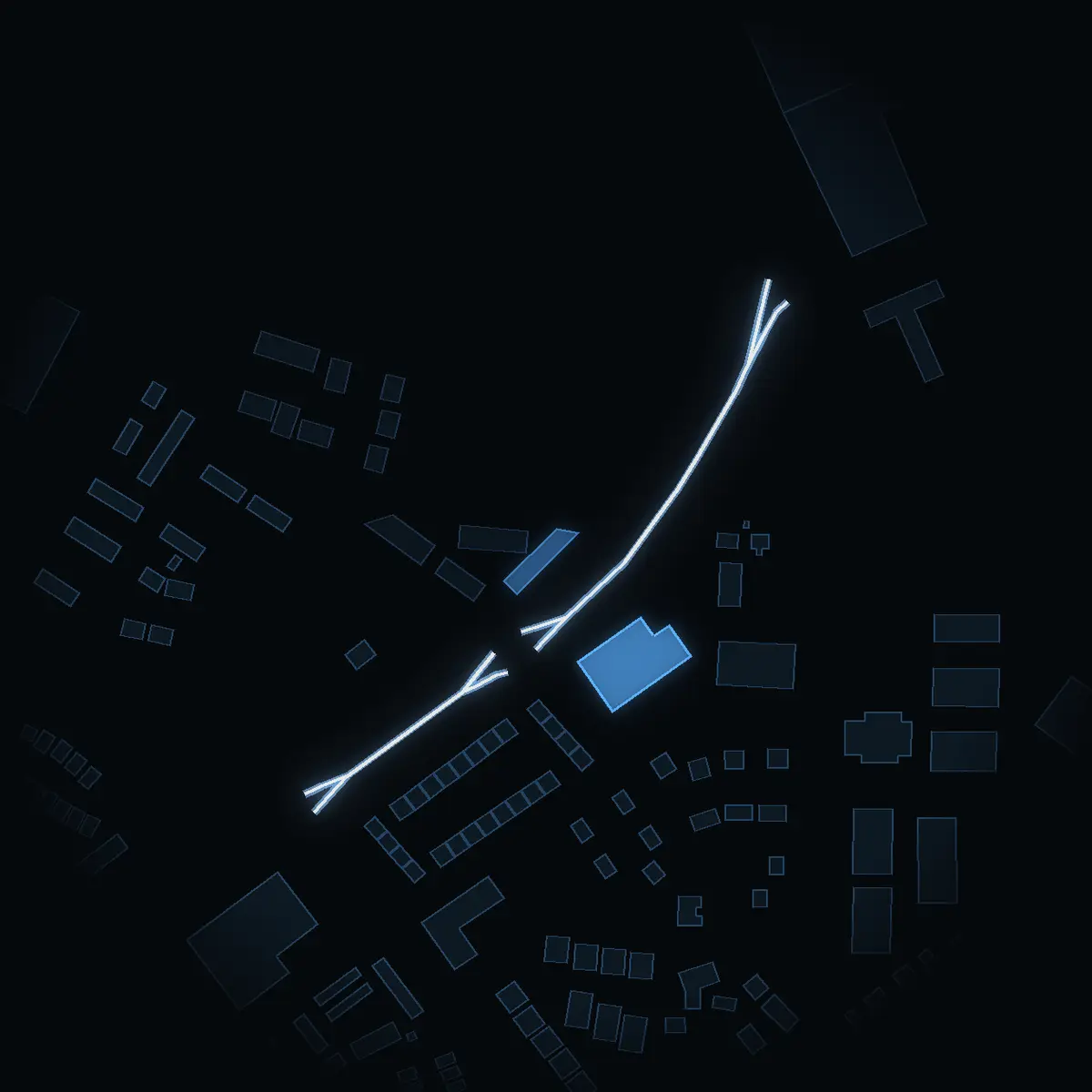 The street at night: Vinlandsvägen drawn in white, its buildings lit in the colour of their area’s income