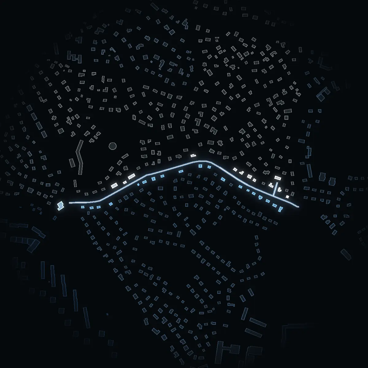 The street at night: Mosstorpsvägen drawn in white, its buildings lit in the colour of their area’s income