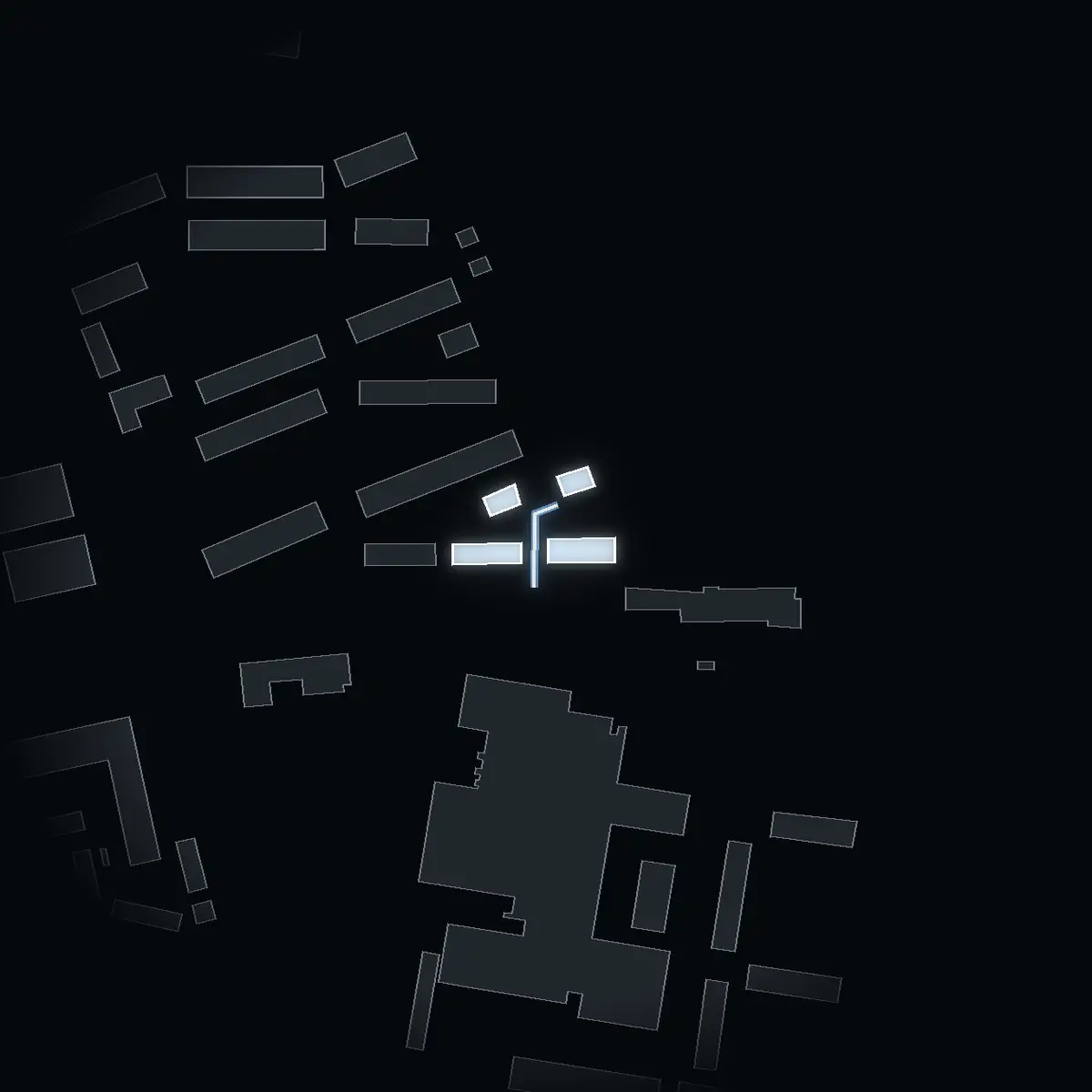 The street at night: Södra Hamnpromenaden drawn in white, its buildings lit in the colour of their area’s income