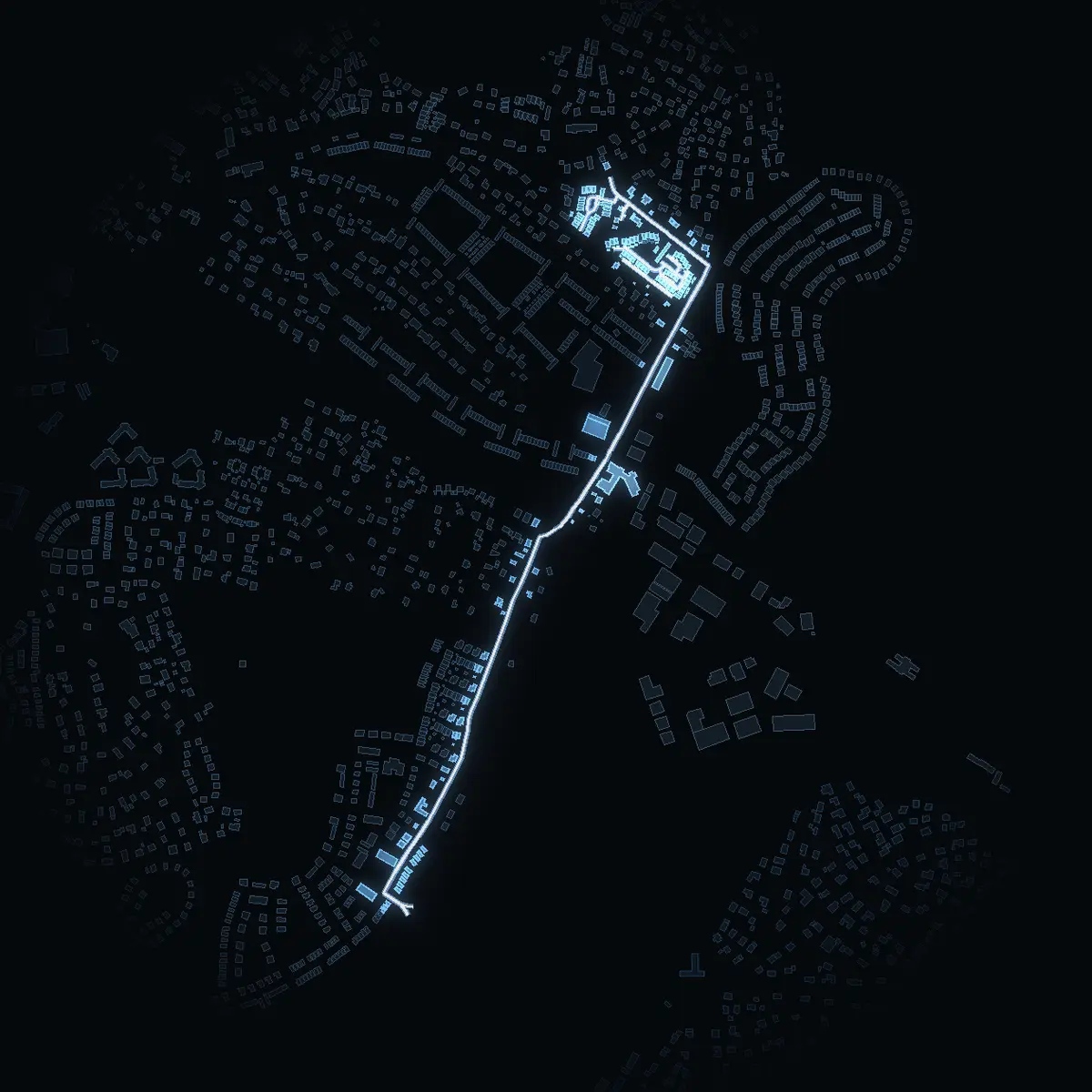 The street at night: Lovisedalsvägen drawn in white, its buildings lit in the colour of their area’s income