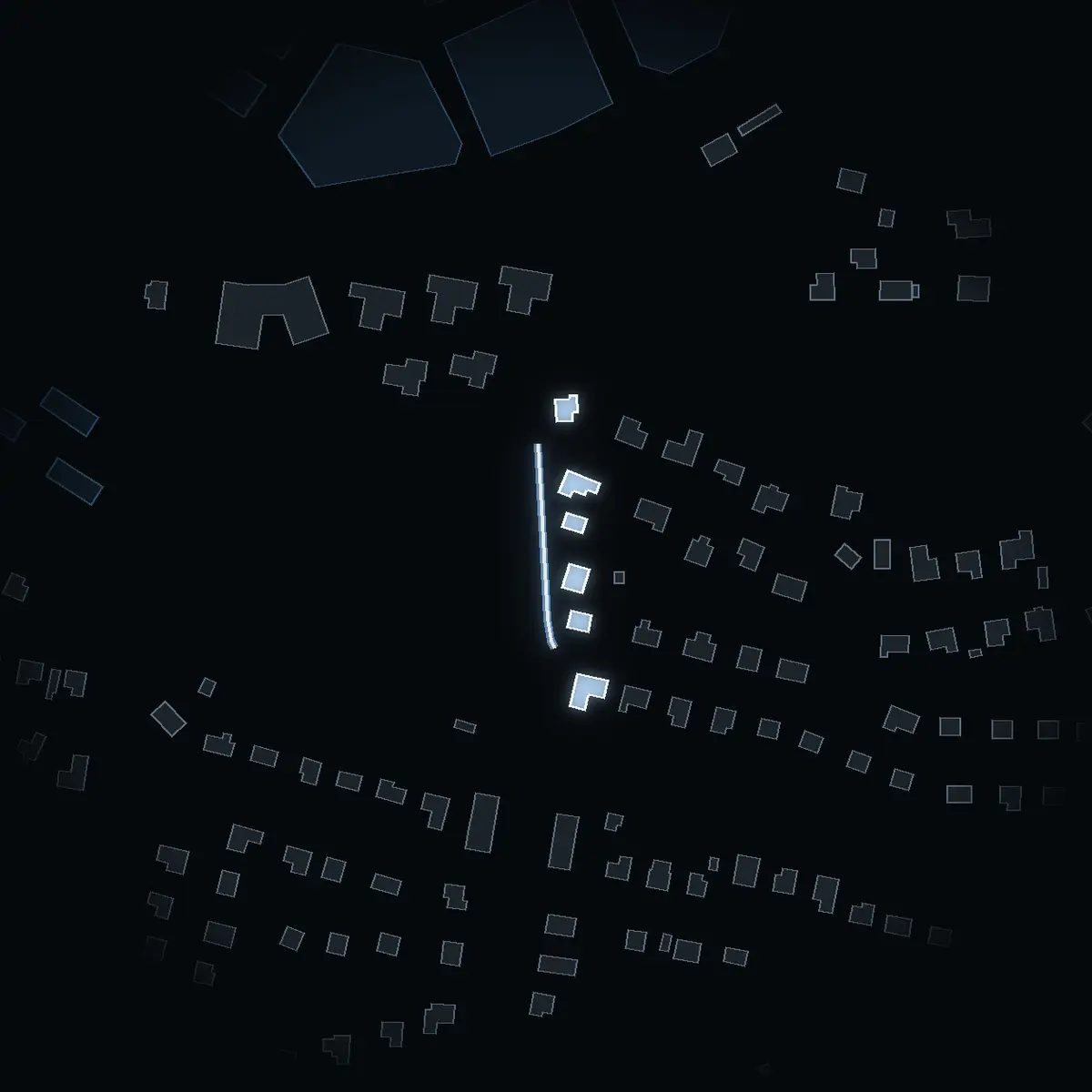 The street at night: Stationsvägen drawn in white, its buildings lit in the colour of their area’s income