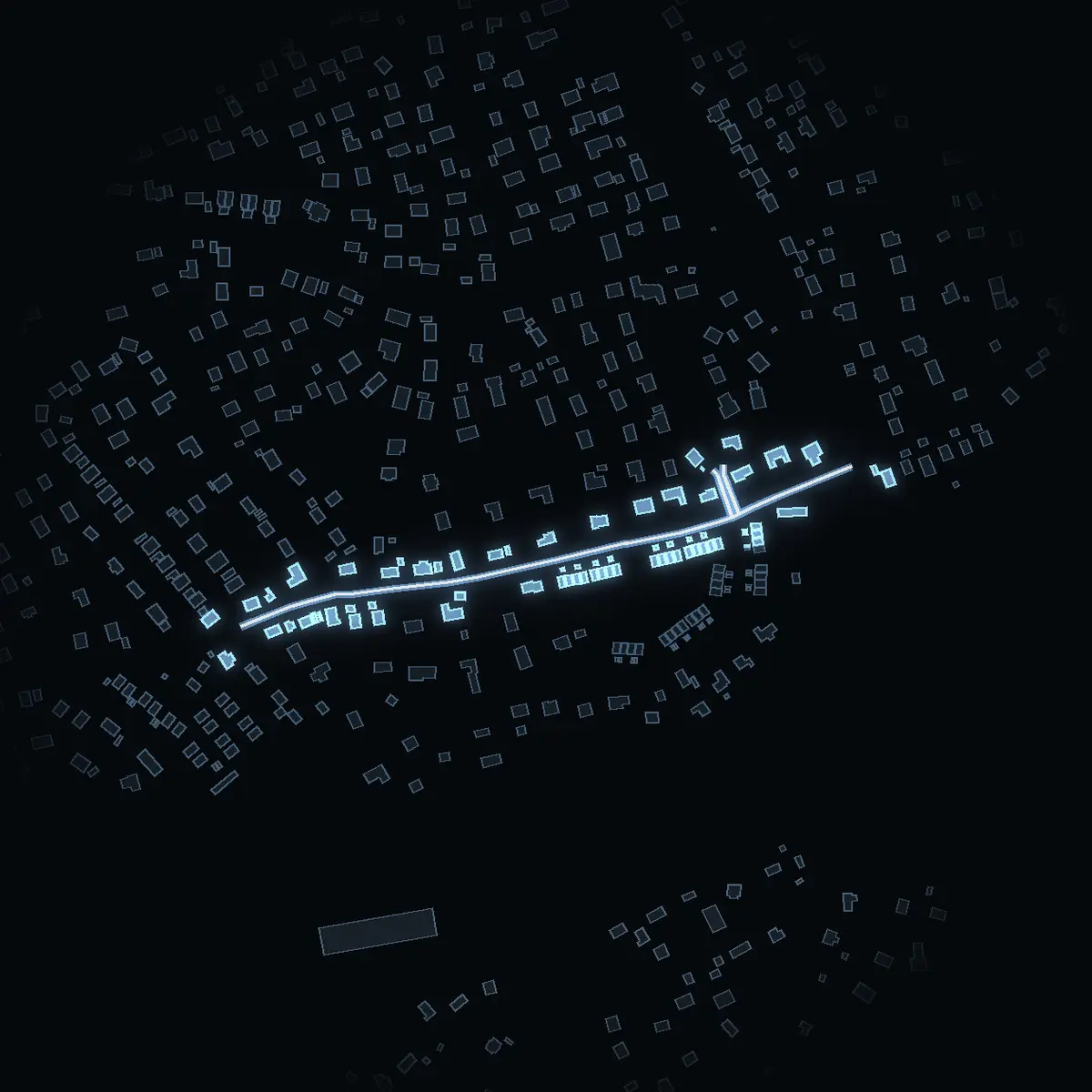 The street at night: Tunvägen drawn in white, its buildings lit in the colour of their area’s income