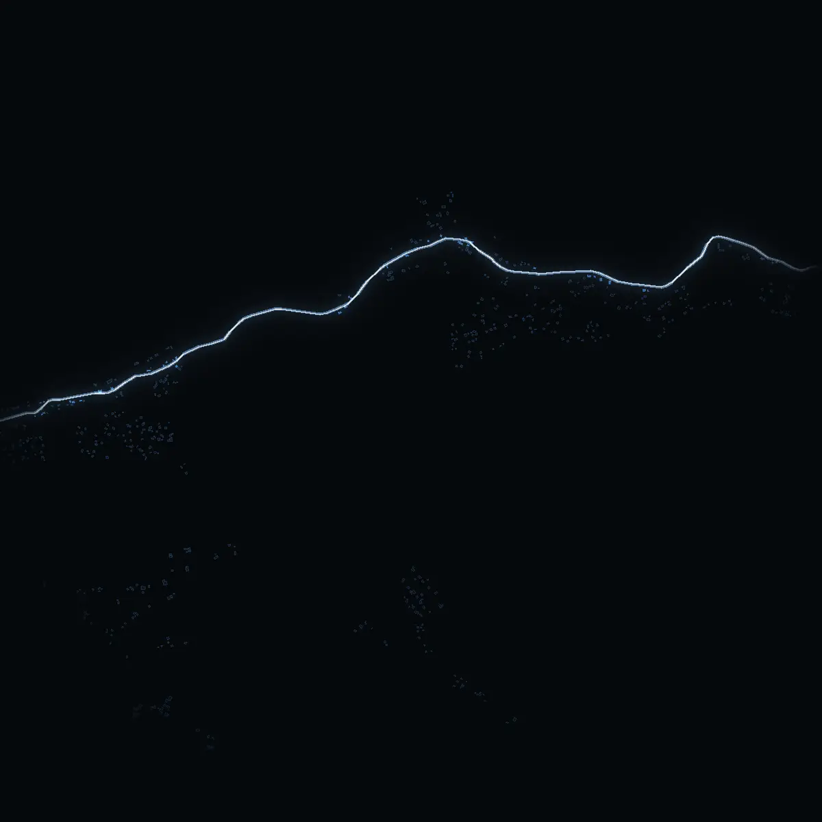 The street at night: Abrahamsbyvägen drawn in white, its buildings lit in the colour of their area’s income