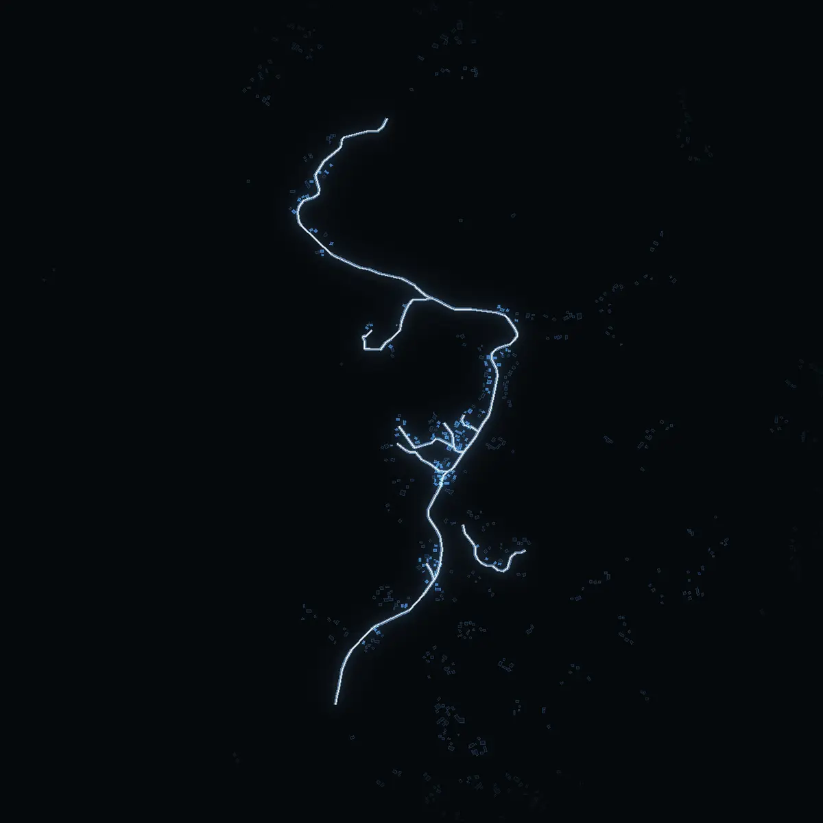 The street at night: Backbyvägen drawn in white, its buildings lit in the colour of their area’s income