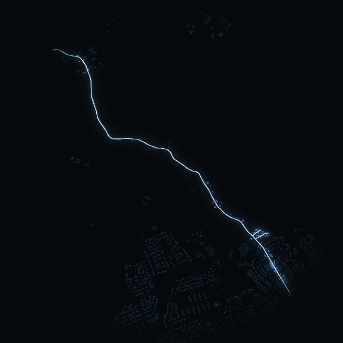 The street at night: Ekebyvägen drawn in white, its buildings lit in the colour of their area’s income