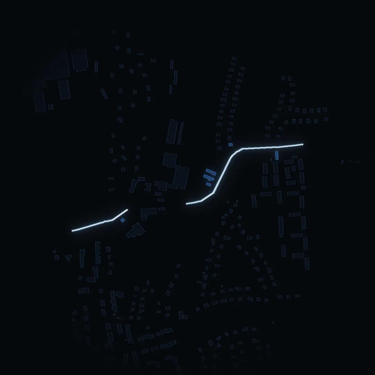 The street at night: Envägen drawn in white, its buildings lit in the colour of their area’s income
