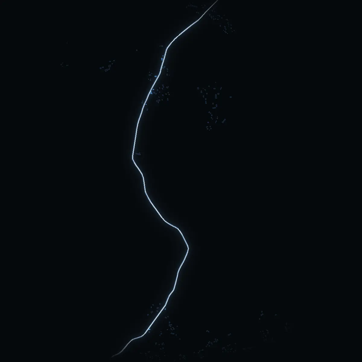 The street at night: Gamla Väsbyvägen drawn in white, its buildings lit in the colour of their area’s income