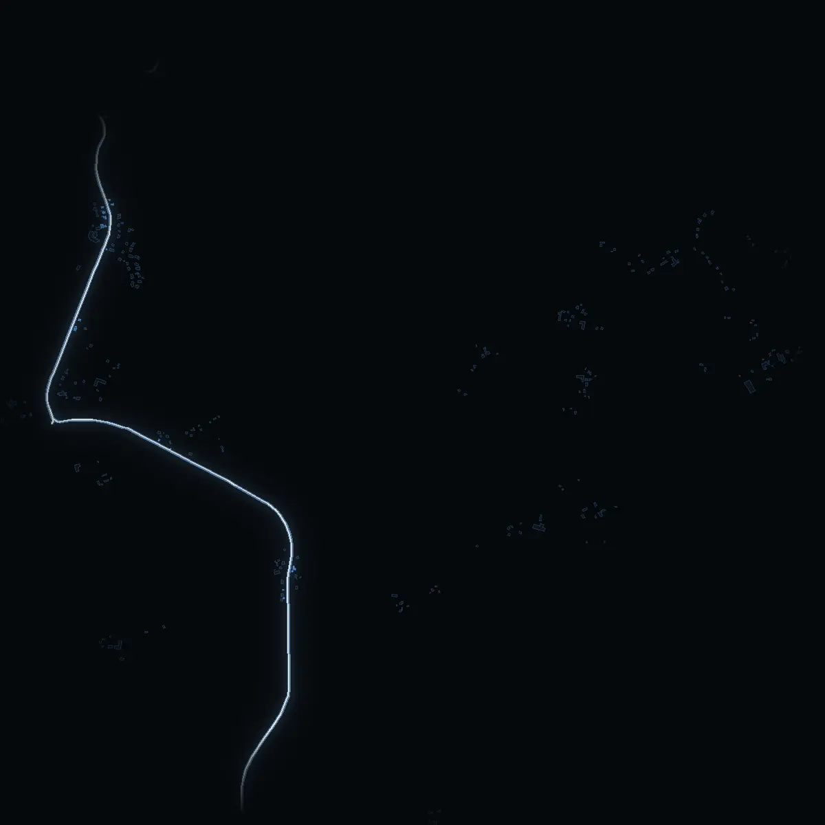 The street at night: Roslagsbrovägen drawn in white, its buildings lit in the colour of their area’s income