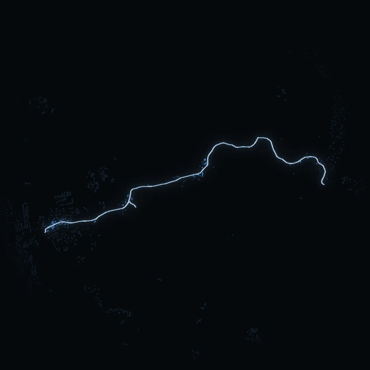 The street at night: Sandviksvägen drawn in white, its buildings lit in the colour of their area’s income