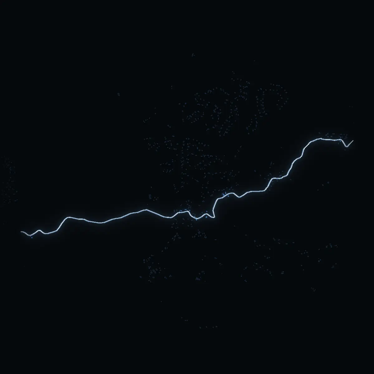 The street at night: Sättravägen drawn in white, its buildings lit in the colour of their area’s income