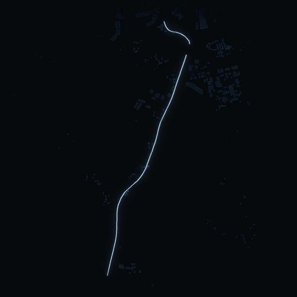 The street at night: Södra Kustvägen drawn in white, its buildings lit in the colour of their area’s income