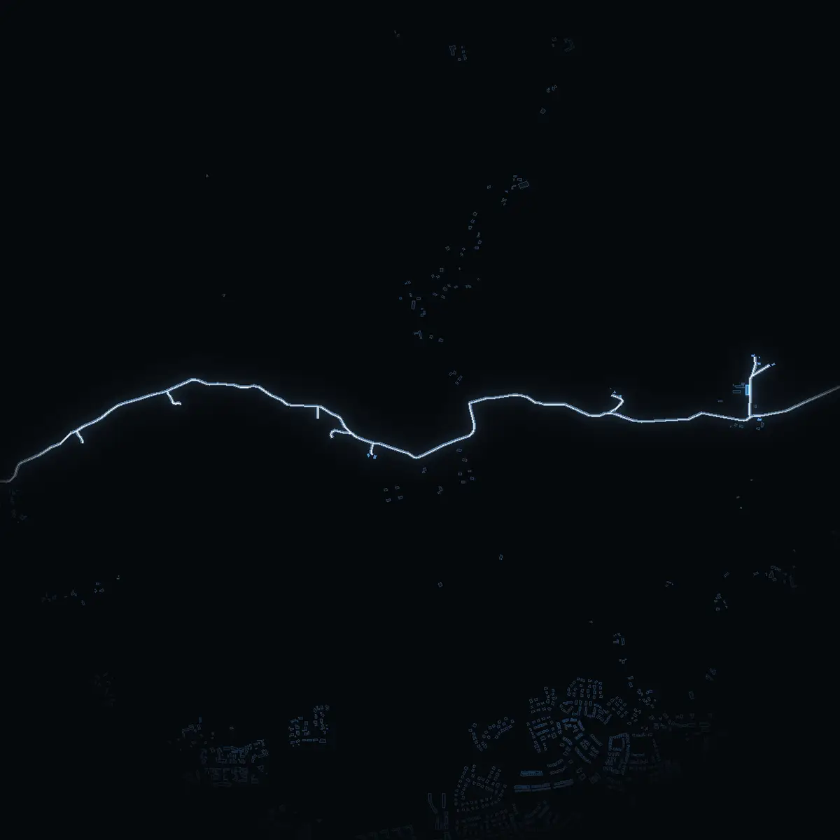 The street at night: Uddeboövägen drawn in white, its buildings lit in the colour of their area’s income