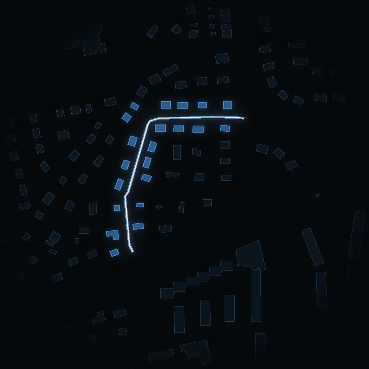 The street at night: Ugglevägen drawn in white, its buildings lit in the colour of their area’s income