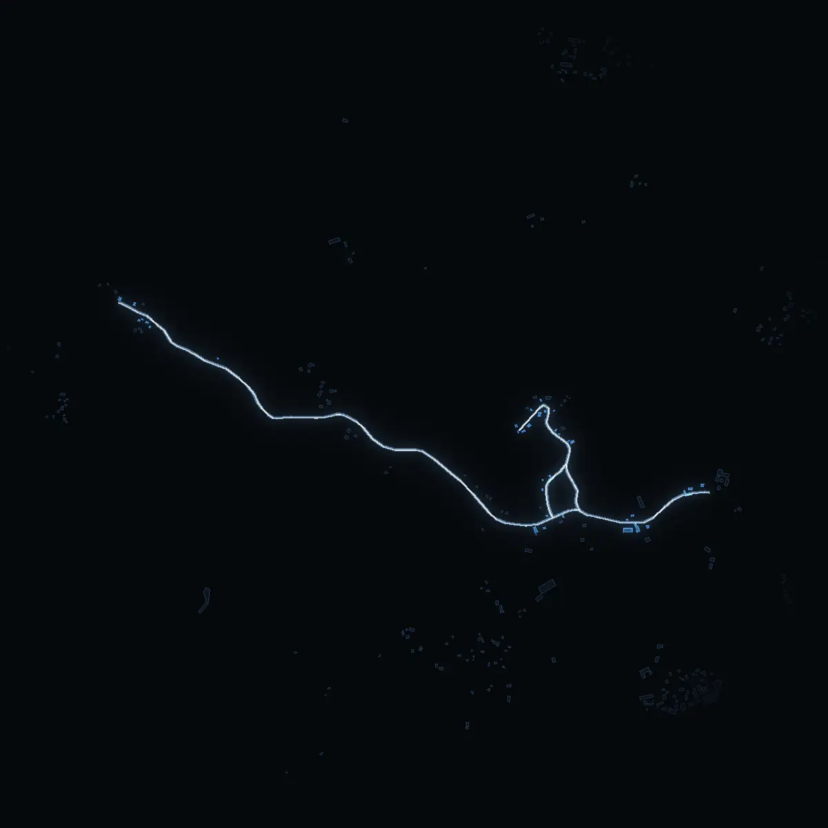 The street at night: Västra Hållstavägen drawn in white, its buildings lit in the colour of their area’s income