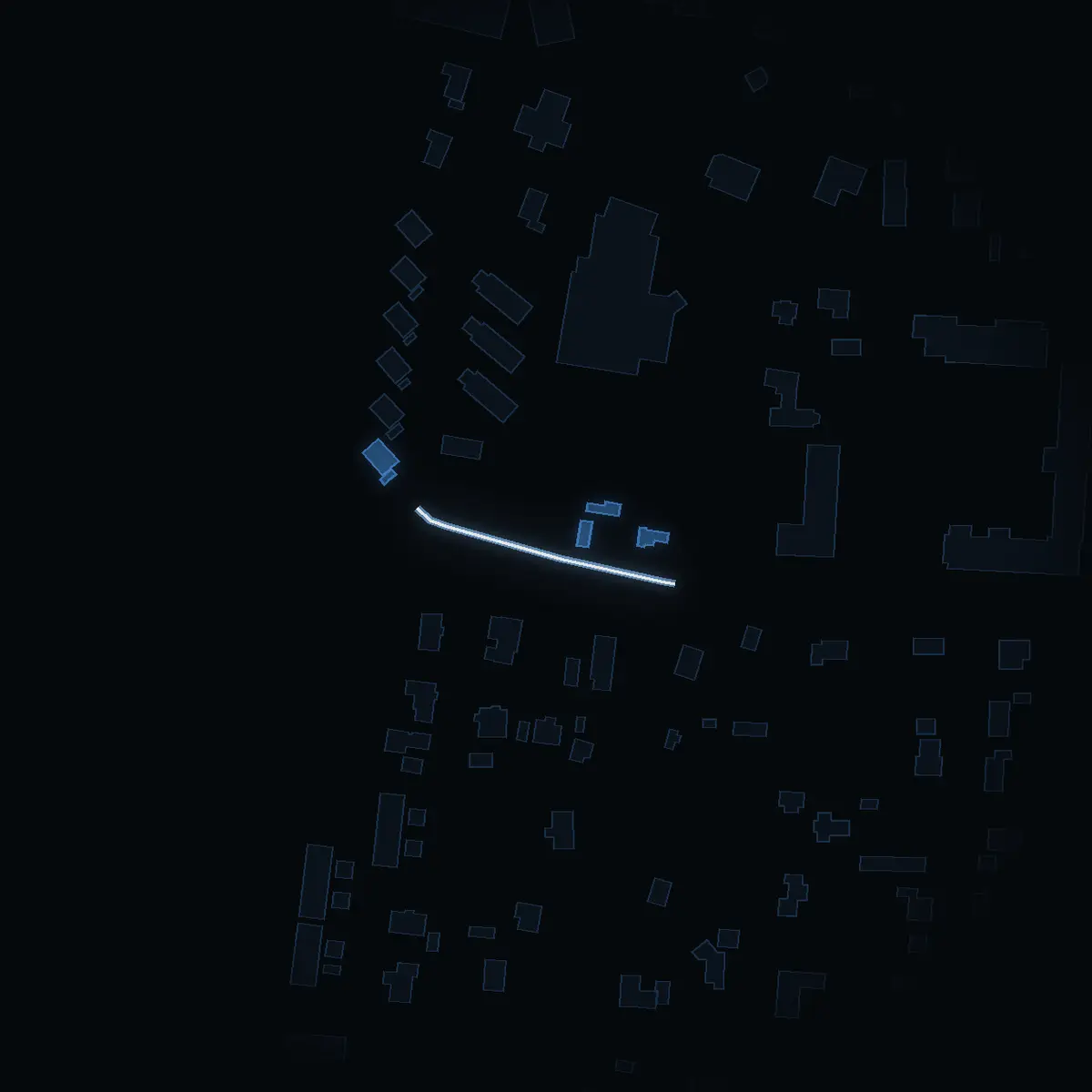 The street at night: Videvägen drawn in white, its buildings lit in the colour of their area’s income
